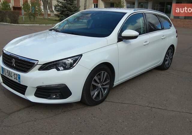 Білий Пежо 308, об'ємом двигуна 1.5 л та пробігом 220 тис. км за 10990 $, фото 1 на Automoto.ua