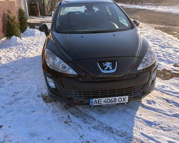 Черный Пежо 308, объемом двигателя 1.56 л и пробегом 230 тыс. км за 5200 $, фото 1 на Automoto.ua