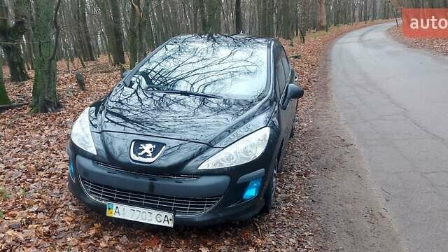 Черный Пежо 308, объемом двигателя 1.6 л и пробегом 288 тыс. км за 5350 $, фото 1 на Automoto.ua