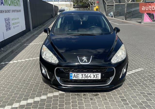 Чорний Пежо 308, об'ємом двигуна 1.6 л та пробігом 99 тис. км за 7200 $, фото 1 на Automoto.ua