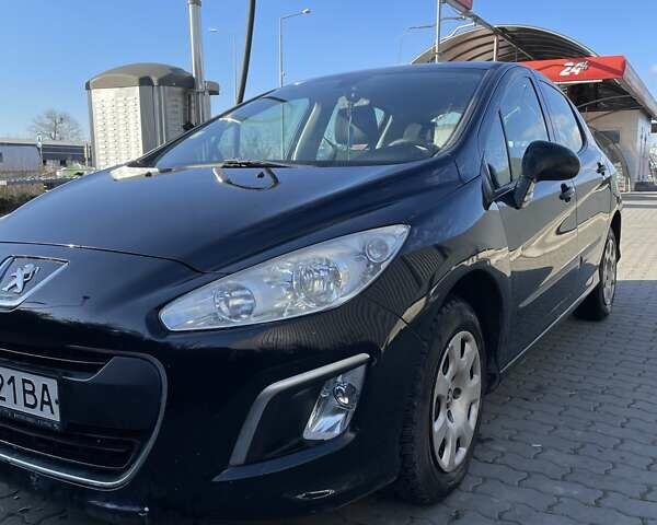 Черный Пежо 308, объемом двигателя 1.6 л и пробегом 170 тыс. км за 6000 $, фото 1 на Automoto.ua
