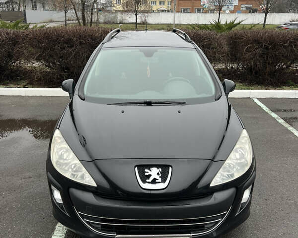 Черный Пежо 308, объемом двигателя 1.6 л и пробегом 260 тыс. км за 4700 $, фото 1 на Automoto.ua