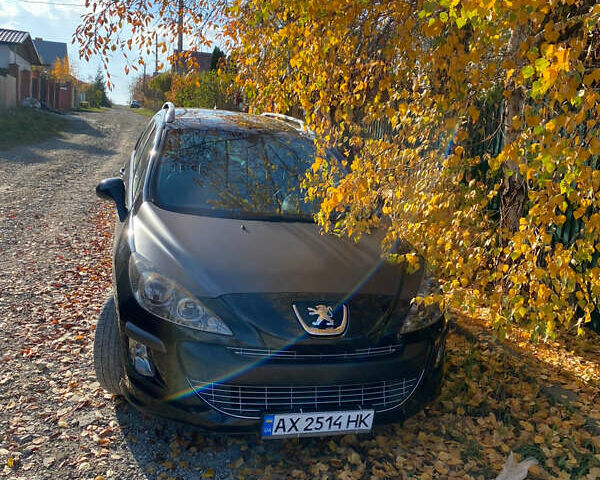Черный Пежо 308, объемом двигателя 2 л и пробегом 305 тыс. км за 7000 $, фото 1 на Automoto.ua