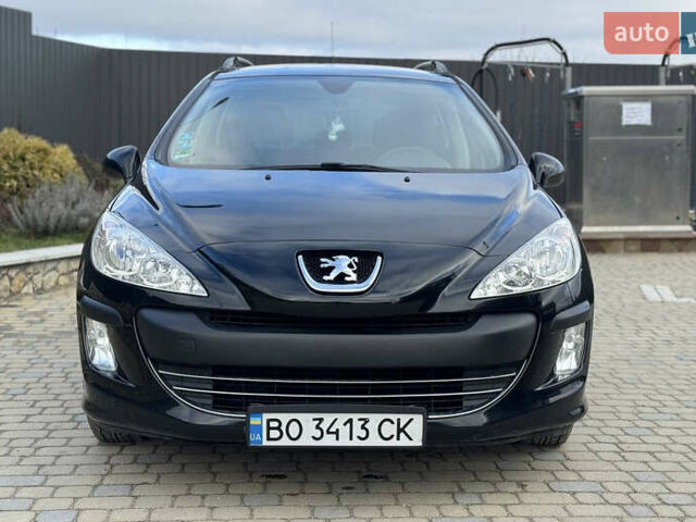 Черный Пежо 308, объемом двигателя 1.4 л и пробегом 251 тыс. км за 4300 $, фото 1 на Automoto.ua