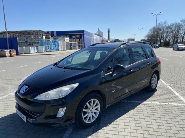 Черный Пежо 308, объемом двигателя 2 л и пробегом 252 тыс. км за 5000 $, фото 1 на Automoto.ua