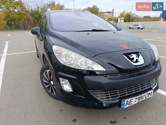 Черный Пежо 308, объемом двигателя 1.6 л и пробегом 278 тыс. км за 3900 $, фото 1 на Automoto.ua