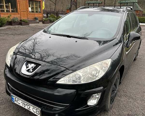 Черный Пежо 308, объемом двигателя 1.56 л и пробегом 212 тыс. км за 5300 $, фото 1 на Automoto.ua