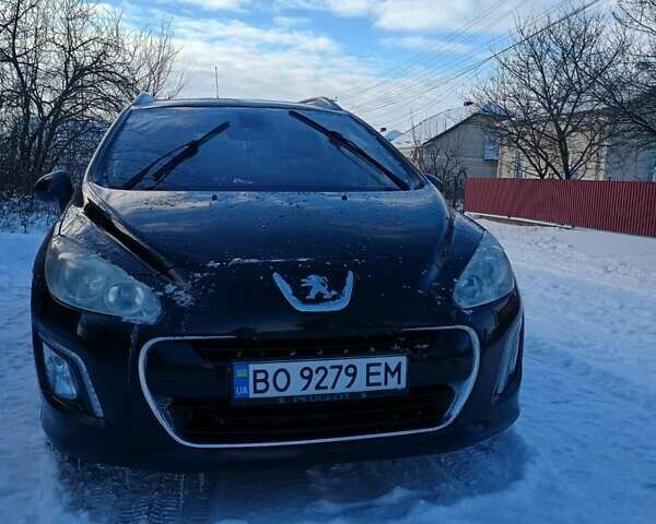 Чорний Пежо 308, об'ємом двигуна 1.56 л та пробігом 302 тис. км за 6600 $, фото 1 на Automoto.ua