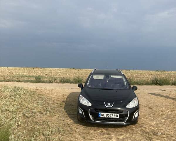 Черный Пежо 308, объемом двигателя 2 л и пробегом 250 тыс. км за 7199 $, фото 1 на Automoto.ua