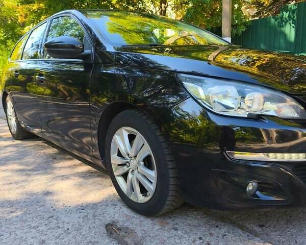 Черный Пежо 308, объемом двигателя 1.56 л и пробегом 221 тыс. км за 9500 $, фото 1 на Automoto.ua