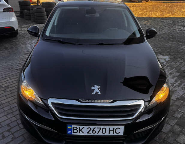 Черный Пежо 308, объемом двигателя 1.56 л и пробегом 218 тыс. км за 8800 $, фото 1 на Automoto.ua