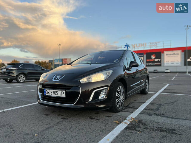 Коричневый Пежо 308, объемом двигателя 1.6 л и пробегом 218 тыс. км за 5850 $, фото 1 на Automoto.ua