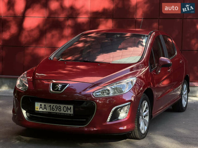 Красный Пежо 308, объемом двигателя 1.6 л и пробегом 169 тыс. км за 6600 $, фото 1 на Automoto.ua