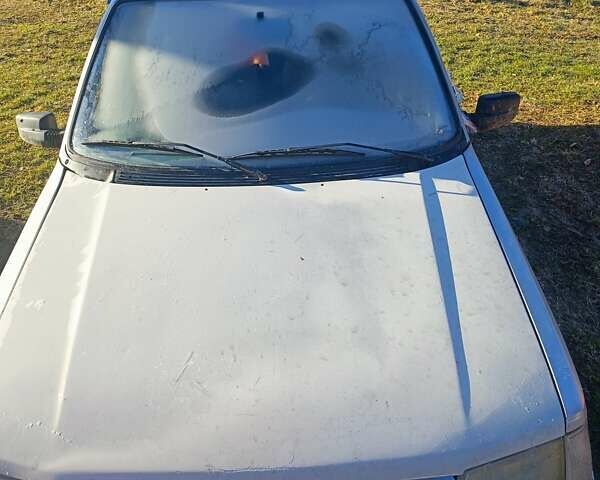 Серый Пежо 308, объемом двигателя 1.9 л и пробегом 300 тыс. км за 799 $, фото 1 на Automoto.ua