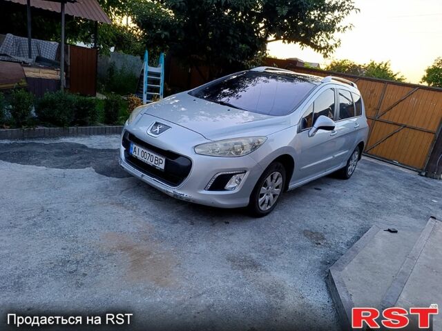 Серый Пежо 308, объемом двигателя 1.6 л и пробегом 350 тыс. км за 4000 $, фото 1 на Automoto.ua