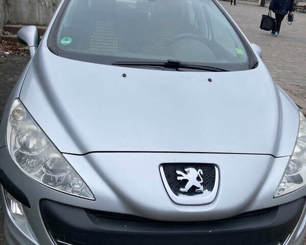 Серый Пежо 308, объемом двигателя 1.56 л и пробегом 238 тыс. км за 5500 $, фото 1 на Automoto.ua