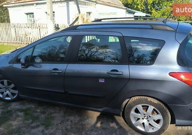 Серый Пежо 308, объемом двигателя 1.56 л и пробегом 200 тыс. км за 6950 $, фото 1 на Automoto.ua