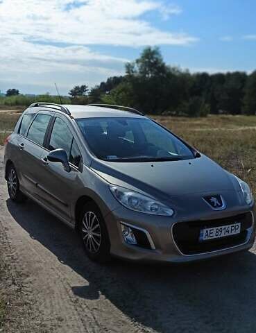 Серый Пежо 308, объемом двигателя 1.6 л и пробегом 198 тыс. км за 7600 $, фото 1 на Automoto.ua