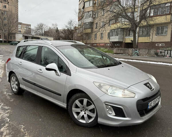 Серый Пежо 308, объемом двигателя 1.56 л и пробегом 250 тыс. км за 4650 $, фото 1 на Automoto.ua
