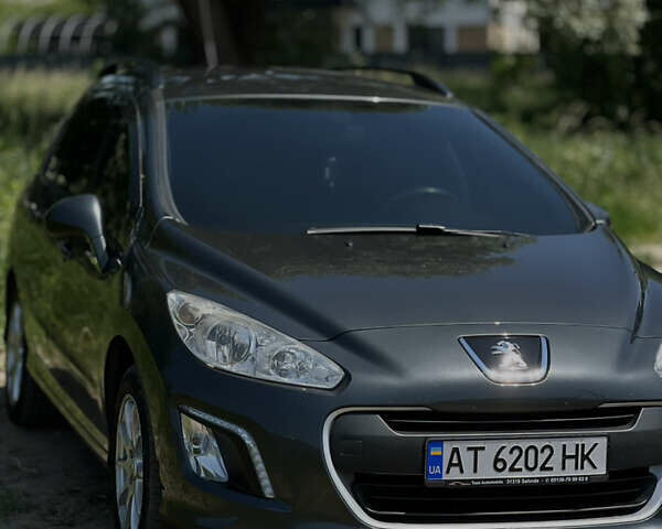 Серый Пежо 308, объемом двигателя 1.56 л и пробегом 260 тыс. км за 6500 $, фото 1 на Automoto.ua