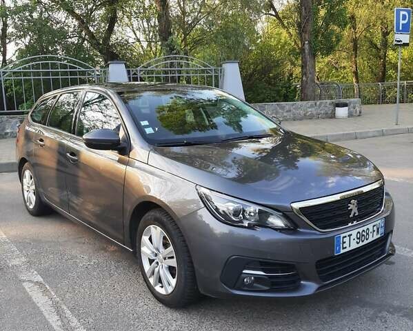 Серый Пежо 308, объемом двигателя 1.56 л и пробегом 254 тыс. км за 10950 $, фото 1 на Automoto.ua