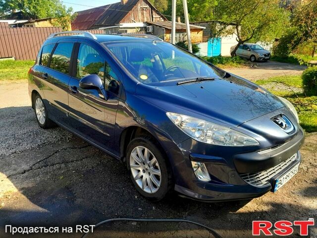 Синий Пежо 308, объемом двигателя 1.6 л и пробегом 242 тыс. км за 5900 $, фото 1 на Automoto.ua