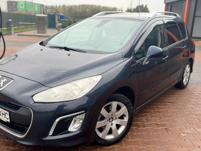 Синий Пежо 308, объемом двигателя 1.6 л и пробегом 170 тыс. км за 6200 $, фото 1 на Automoto.ua