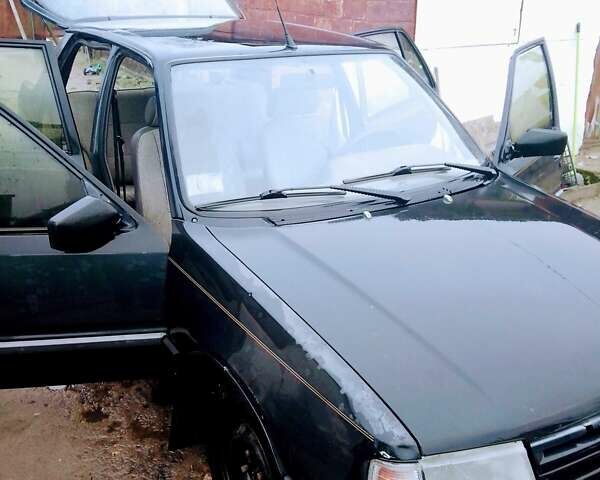 Чорний Пежо 309, об'ємом двигуна 1.4 л та пробігом 78 тис. км за 355 $, фото 1 на Automoto.ua