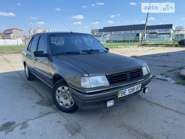 Сірий Пежо 309, об'ємом двигуна 1.36 л та пробігом 300 тис. км за 800 $, фото 1 на Automoto.ua