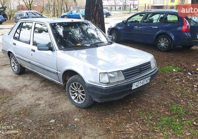 Серый Пежо 309, объемом двигателя 1.4 л и пробегом 222 тыс. км за 1300 $, фото 1 на Automoto.ua