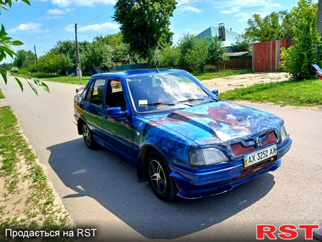 Синий Пежо 309, объемом двигателя 1.6 л и пробегом 200 тыс. км за 2300 $, фото 1 на Automoto.ua