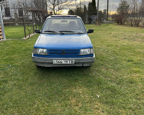 Синій Пежо 309, об'ємом двигуна 1.6 л та пробігом 390 тис. км за 613 $, фото 1 на Automoto.ua