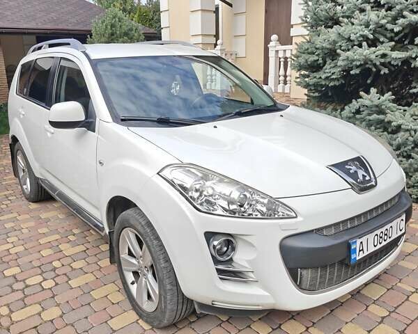 Белый Пежо 4007, объемом двигателя 2.18 л и пробегом 188 тыс. км за 9800 $, фото 1 на Automoto.ua