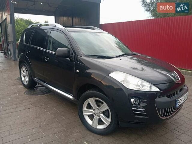 Черный Пежо 4007, объемом двигателя 2.2 л и пробегом 268 тыс. км за 9800 $, фото 1 на Automoto.ua