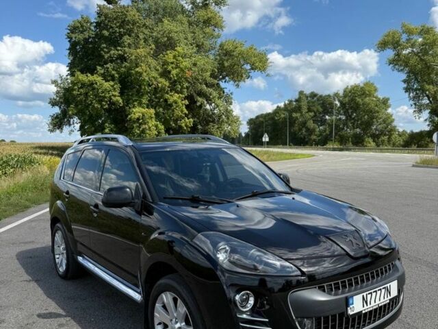 Черный Пежо 4007, объемом двигателя 2.2 л и пробегом 250 тыс. км за 10500 $, фото 1 на Automoto.ua