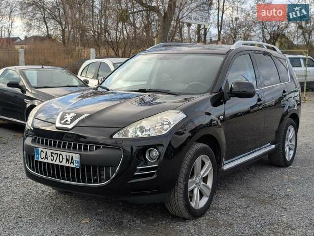 Чорний Пежо 4007, об'ємом двигуна 2.2 л та пробігом 184 тис. км за 9990 $, фото 1 на Automoto.ua
