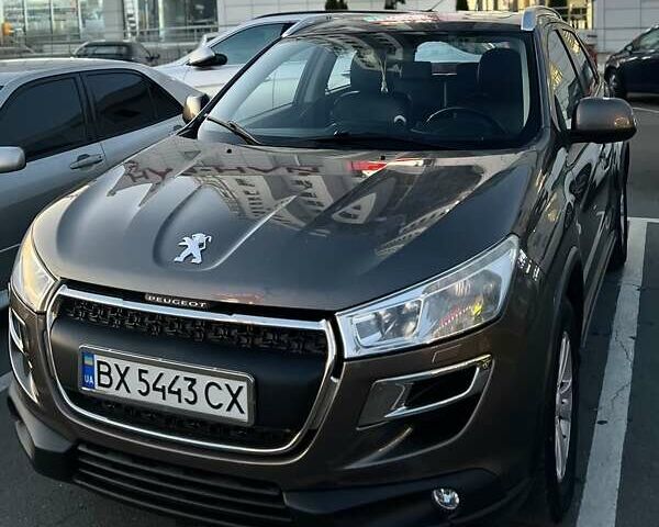 Коричневый Пежо 4008, объемом двигателя 2 л и пробегом 203 тыс. км за 10900 $, фото 1 на Automoto.ua