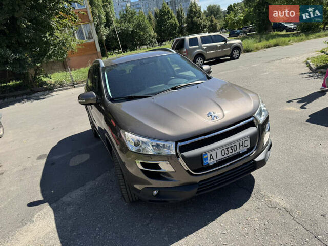 Коричневый Пежо 4008, объемом двигателя 2 л и пробегом 160 тыс. км за 12500 $, фото 1 на Automoto.ua