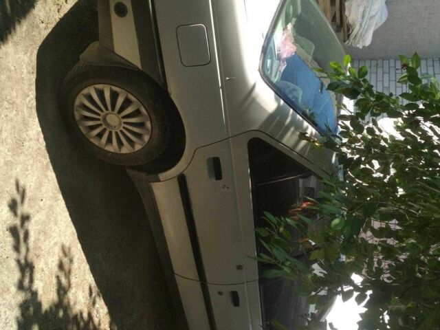 Белый Пежо 405, объемом двигателя 1.4 л и пробегом 190 тыс. км за 650 $, фото 1 на Automoto.ua