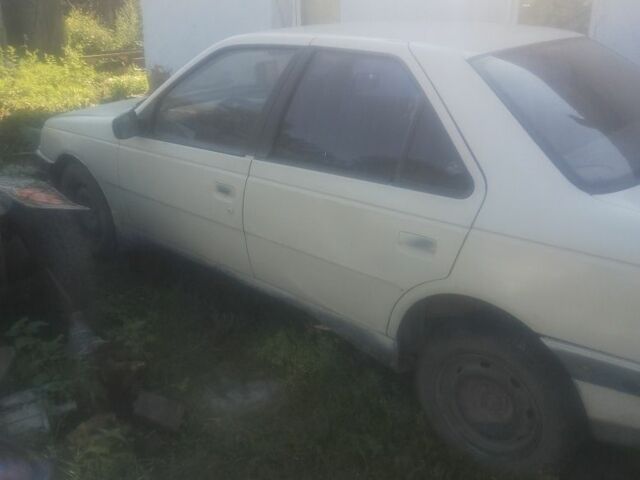 Бежевый Пежо 405, объемом двигателя 1.4 л и пробегом 1 тыс. км за 311 $, фото 1 на Automoto.ua