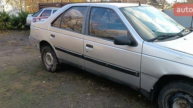 Серый Пежо 405, объемом двигателя 1.9 л и пробегом 220 тыс. км за 462 $, фото 1 на Automoto.ua