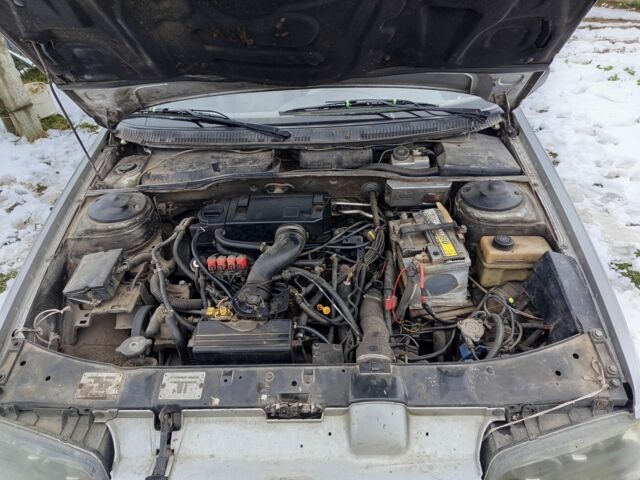 Серый Пежо 405, объемом двигателя 2 л и пробегом 300 тыс. км за 1100 $, фото 1 на Automoto.ua