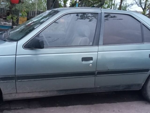 Зеленый Пежо 405, объемом двигателя 1.6 л и пробегом 360 тыс. км за 700 $, фото 1 на Automoto.ua