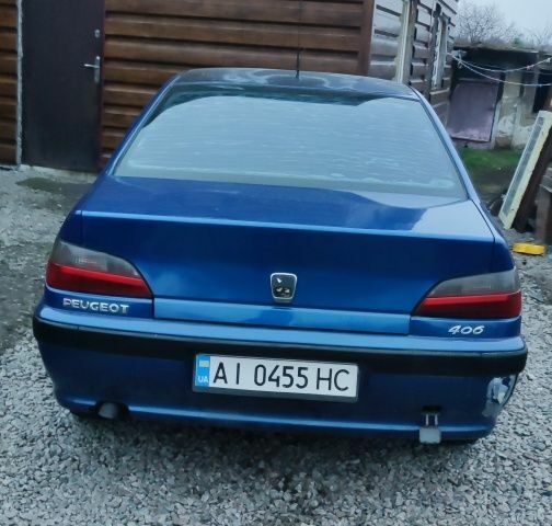 Синий Пежо 406, объемом двигателя 1.8 л и пробегом 300 тыс. км за 1500 $, фото 1 на Automoto.ua