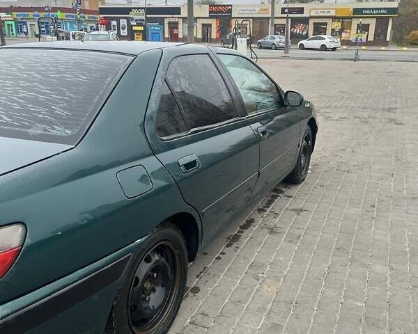 Зеленый Пежо 406, объемом двигателя 1.8 л и пробегом 270 тыс. км за 3000 $, фото 1 на Automoto.ua