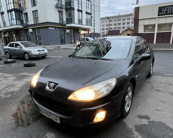 Черный Пежо 407, объемом двигателя 1.8 л и пробегом 297 тыс. км за 2899 $, фото 1 на Automoto.ua