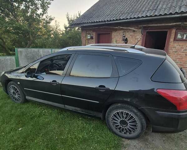 Черный Пежо 407, объемом двигателя 2 л и пробегом 254 тыс. км за 4500 $, фото 1 на Automoto.ua