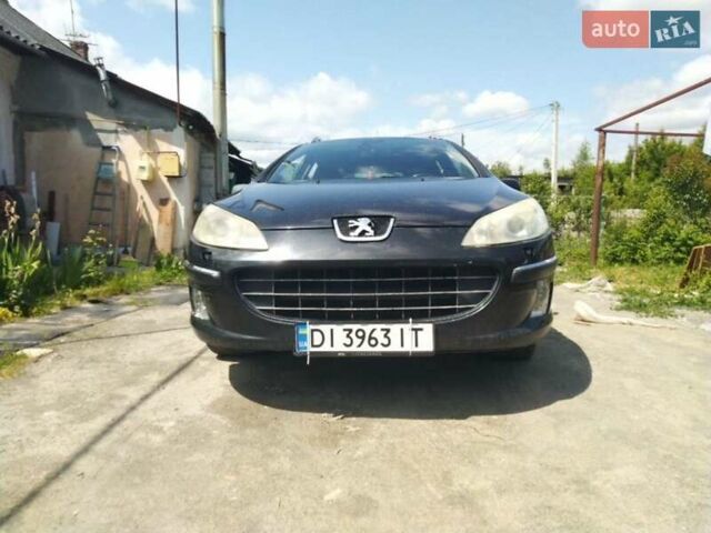 Черный Пежо 407, объемом двигателя 2 л и пробегом 320 тыс. км за 4200 $, фото 1 на Automoto.ua