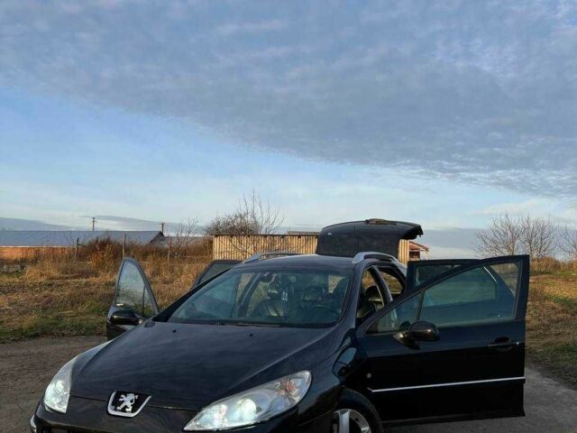 Черный Пежо 407, объемом двигателя 2 л и пробегом 306 тыс. км за 5000 $, фото 1 на Automoto.ua