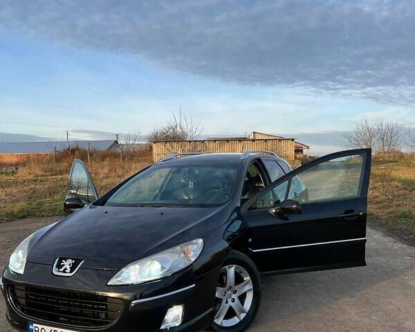 Черный Пежо 407, объемом двигателя 2 л и пробегом 307 тыс. км за 5100 $, фото 1 на Automoto.ua